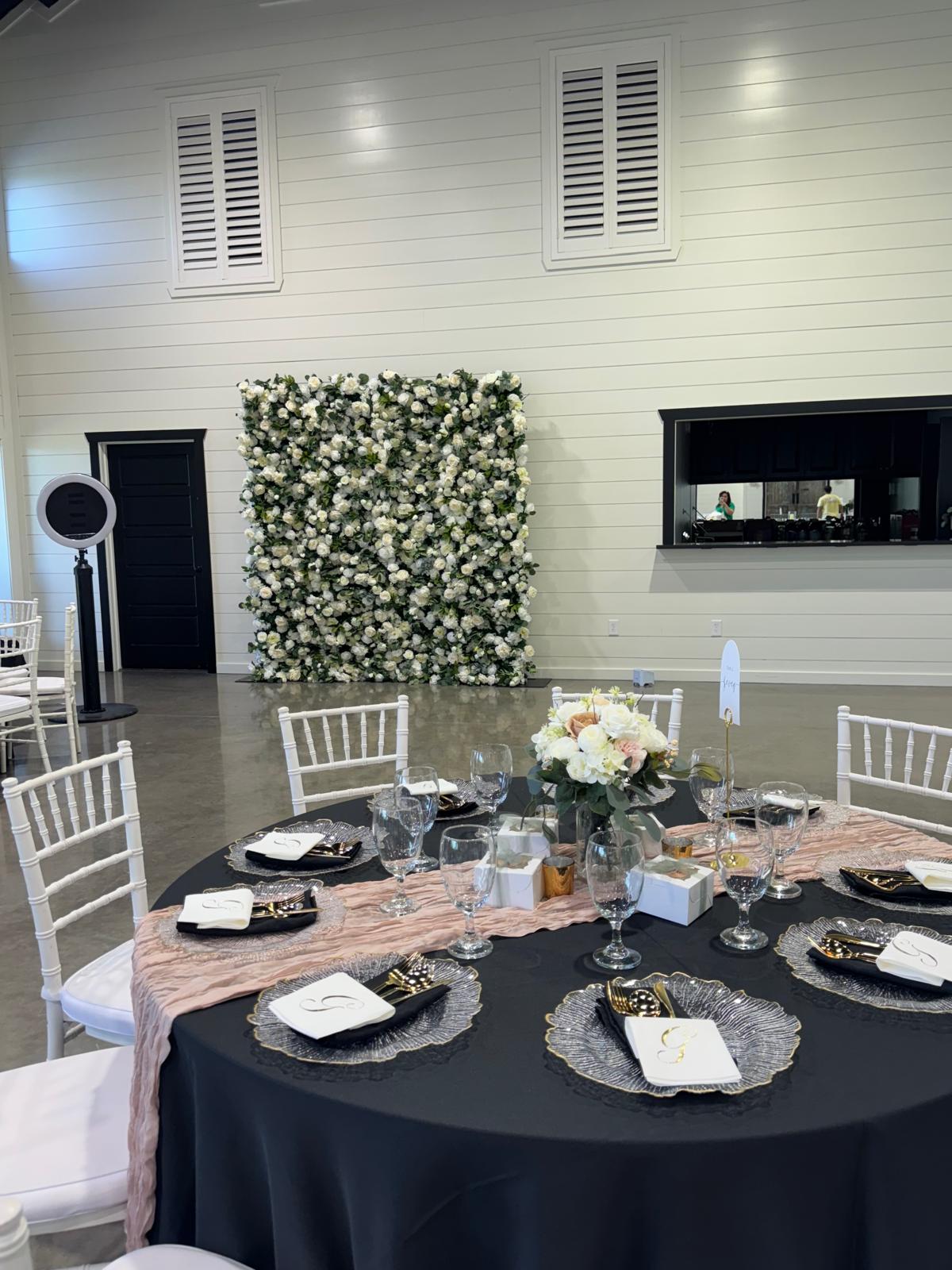 Close-up detail of white floral wall