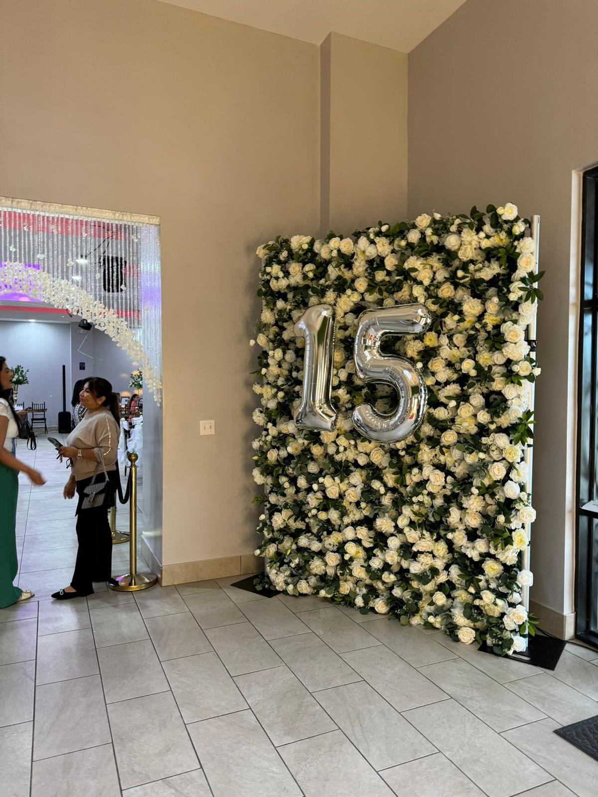 Flower wall setup for a baby shower